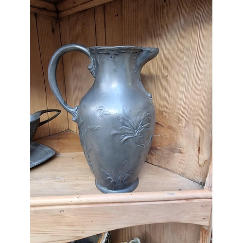 1199 - A WMF Art Nouveau pewter jug, 20cm high; together with another Secessionist pewter sauceboat. (... 