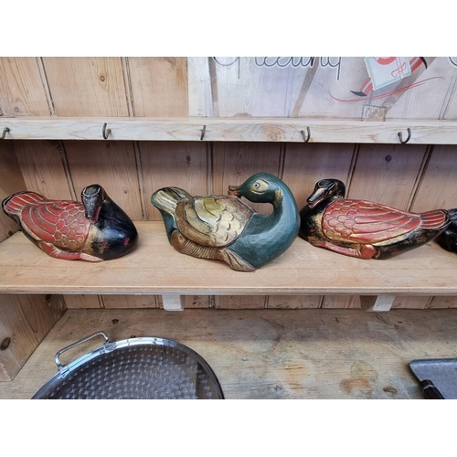 1203 - A mixed group of Chinese items, to include three polychrome painted carved wood geese, largest 25.5c... 