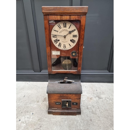 1206 - A vintage National Time Recorder Co Ltd clocking-in clock, 99cm high. 