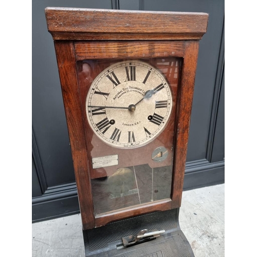 1206 - A vintage National Time Recorder Co Ltd clocking-in clock, 99cm high. 