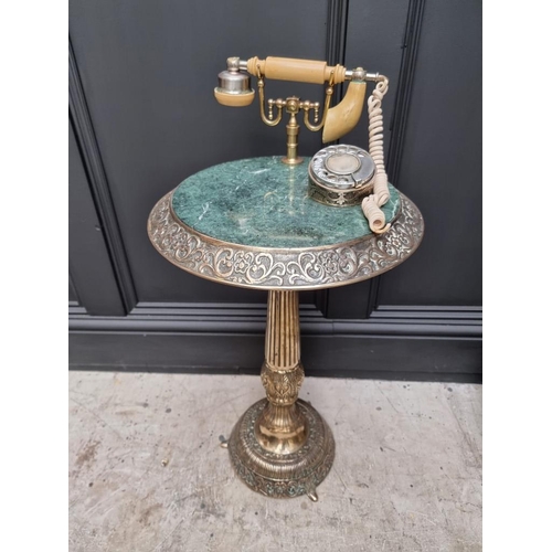 1226 - A vintage brass and green marble telephone table. (a.f.)  