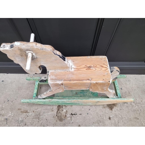 1227 - A small painted wood rocking horse, 103cm long. 