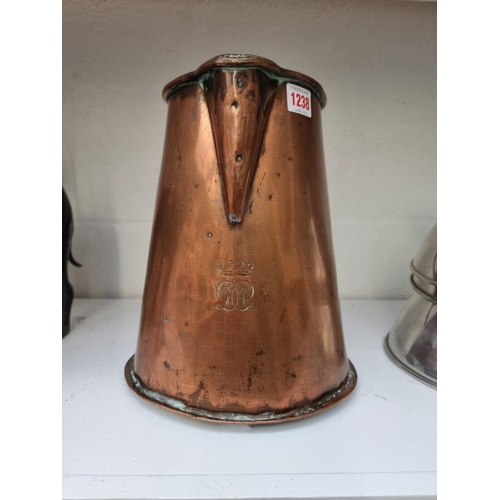 1238 - A Victorian copper jug, with coronet and monogram, 28.5cm high. 