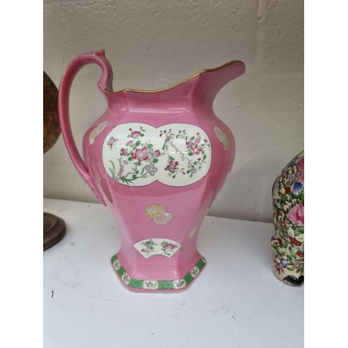 1244 - A Carlton ware 'Kien Lung' jug, 33cm high.