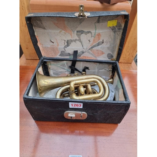 1263 - A vintage Boosey 'Heley' brass pocket or piccolo cornet, in case.