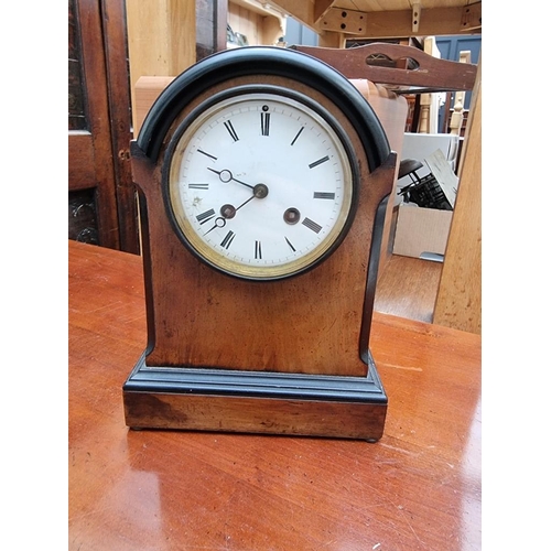 1270 - A Victorian walnut and inlaid mantel clock, by Camerer, Kuss, Tritschler & Co, 24cm high, with p... 