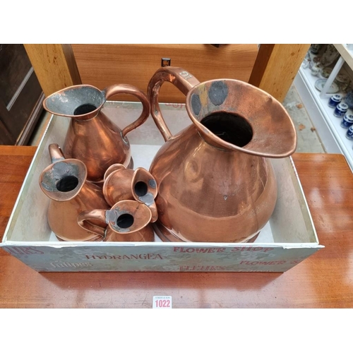 1275 - A graduated matched set of six copper haystack measures, half gill to one gallon.