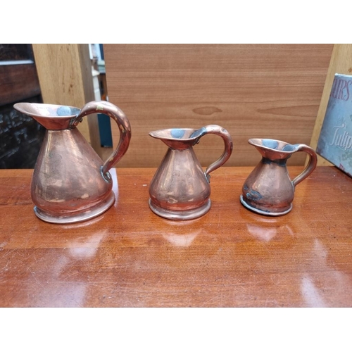 1275 - A graduated matched set of six copper haystack measures, half gill to one gallon.