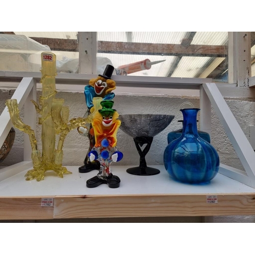 1282 - A mixed group of glassware, to include a Venetian clown, 36cm high. (two shelves)