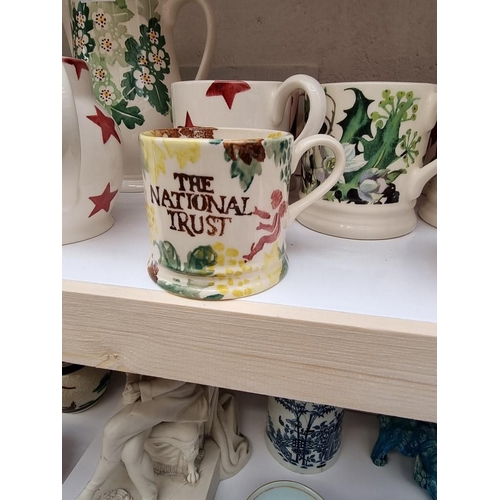 1291 - Fifteen Emma Bridgewater pottery mugs and jugs, one boxed. (15)