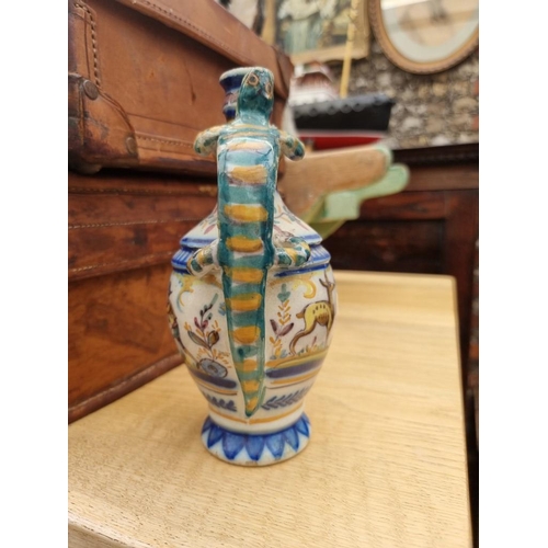 1298 - A collection of French faience, to include a novelty cat wall pocket, 22cm high. (10)... 