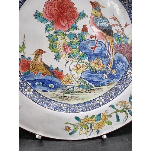 1305 - A Chinese Canton enamel plate, 22.5cm diameter. 