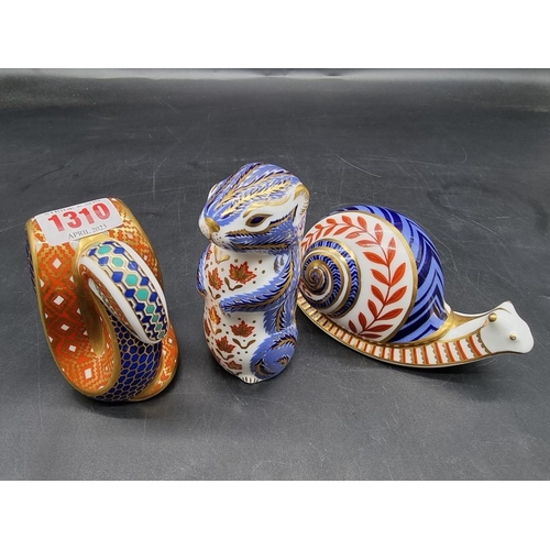 1310 - Three Royal Crown Derby Imari paperweights, comprising: snake; snail, (second); and chipmunk. (3)... 