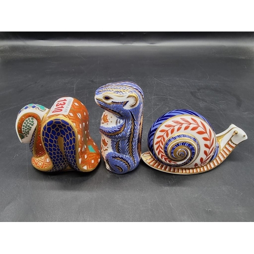 1310 - Three Royal Crown Derby Imari paperweights, comprising: snake; snail, (second); and chipmunk. (3)... 