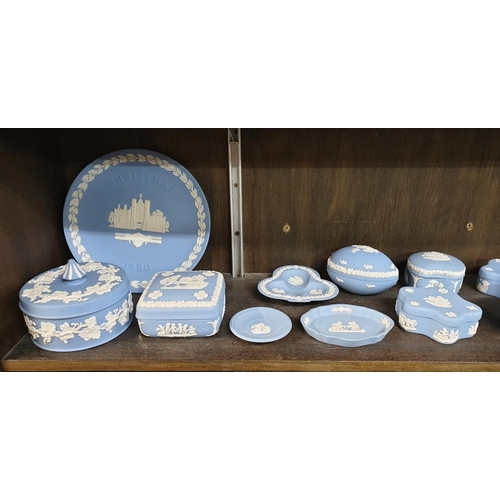 1334 - A large collection of Wedgwood pale blue jasperware.  