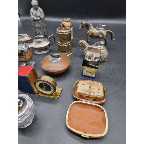 1347 - A collection of sixteen vintage lighters, to include novelty examples; together with two vintage tim... 