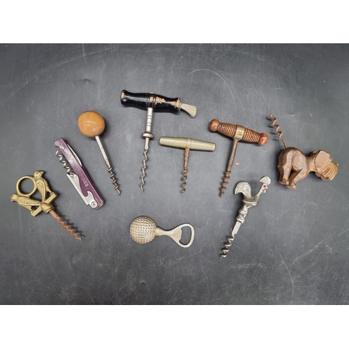 1357 - A small group of corkscrews, penknives and bottle openers.