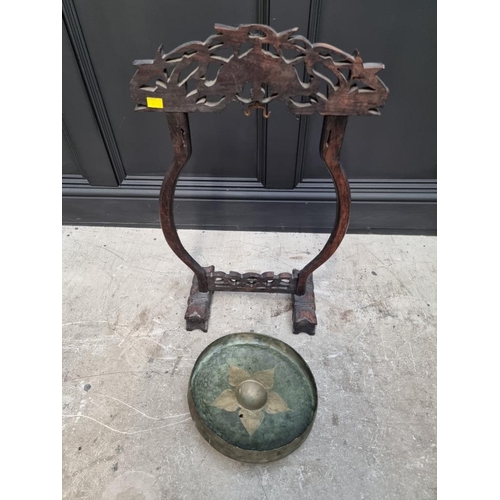 1362 - A Chinese carved hardwood gong stand, 72cm high, (the gong possibly associated).