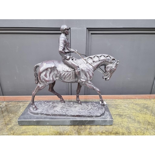 1371 - After P J Mene, a bronze racehorse and jockey, on marble base, 42.5cm.