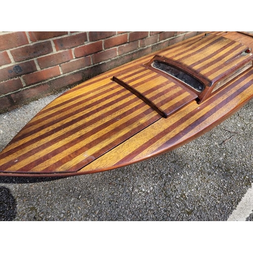 1373 - A large mahogany model launch or speedboat, with engine, 164cm long, on wood stand. ... 