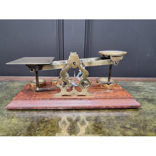 1374 - A good set of mahogany and brass postage scales, by S Mordan & Co, with weights, 31.5cm wide.&nb... 