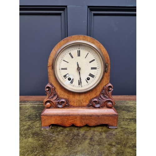 1380 - A late 19th century walnut dome top mantel clock, by W & H, 28cm high, with pendulum.... 