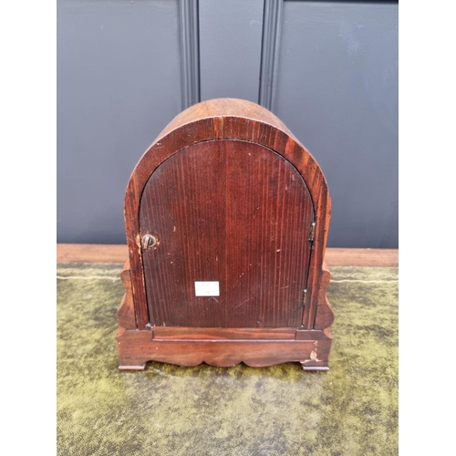 1380 - A late 19th century walnut dome top mantel clock, by W & H, 28cm high, with pendulum.... 