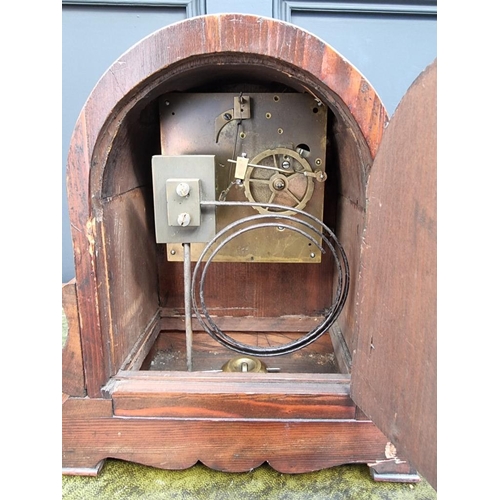 1380 - A late 19th century walnut dome top mantel clock, by W & H, 28cm high, with pendulum.... 