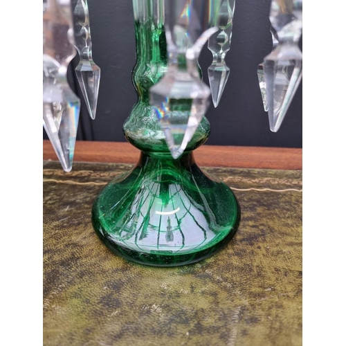 1386 - A pair of antique green flashed glass lustres, 31cm high.