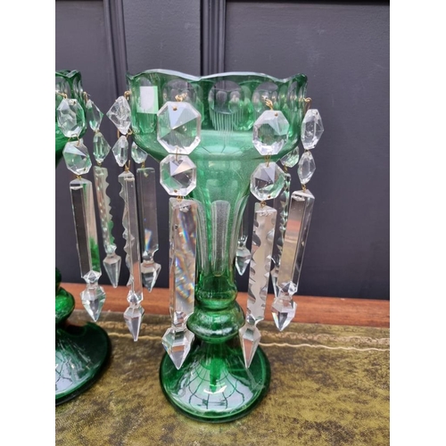 1386 - A pair of antique green flashed glass lustres, 31cm high.