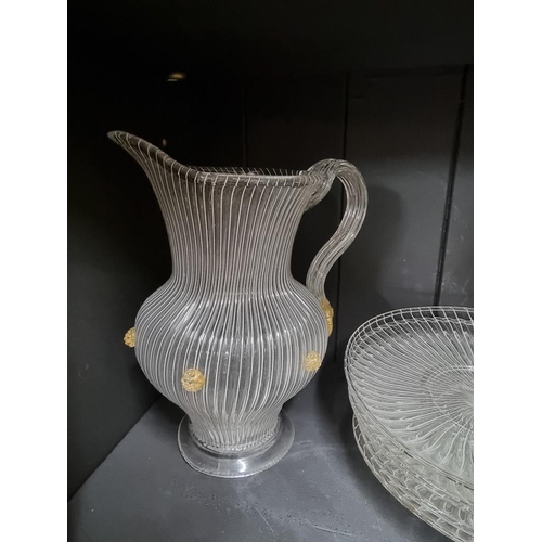 1403 - A Murano glass facon de Venise suite, in the manner of Salviati, the jug 28.5cm high, (s.d.). (27)... 