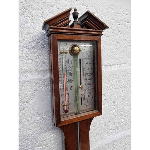 1404 - A reproduction mahogany stick barometer. 