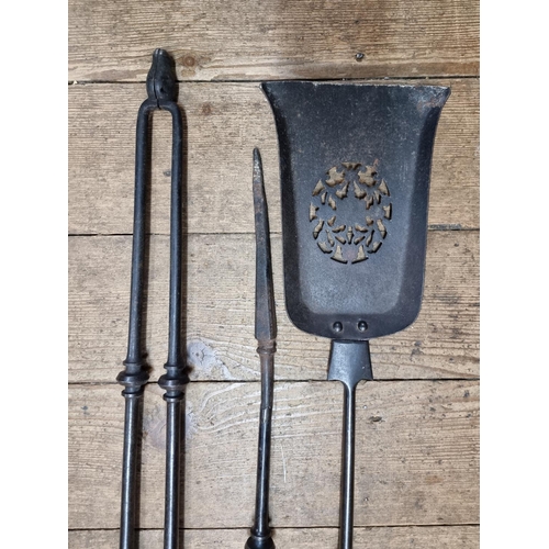 1407 - A set of three Victorian fire irons, (repairs).  