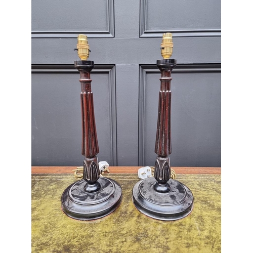 1409 - A pair of mahogany table lamps, height including fitting 48cm. 