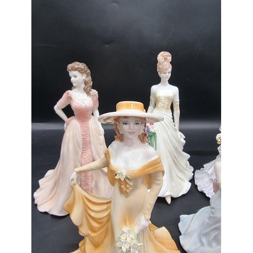 1425 - Nine Coalport figures, comprising: seven 'Ladies of Fashion'; another 'Golden Age' figure; and ... 