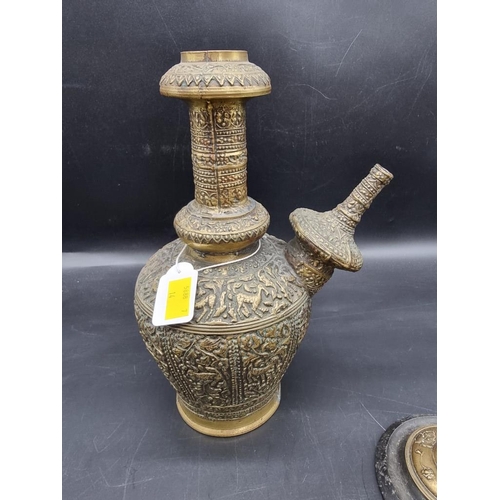 1431 - An antique Persian ewer, with allover stylized decoration, 27.5cm high; together with two pairs of b... 