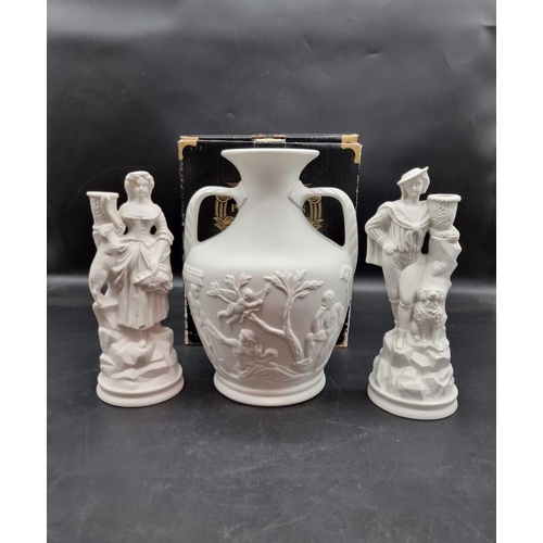 1433 - A Portmeirion Parian 'Portland' vase, 27.5cm high, boxed; together with a similar pair of figural ca... 