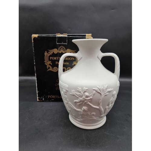 1433 - A Portmeirion Parian 'Portland' vase, 27.5cm high, boxed; together with a similar pair of figural ca... 