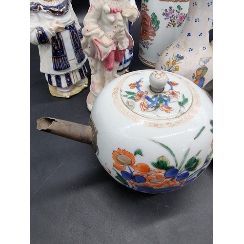 1436 - A mixed group of Continental pottery and porcelain, to include: an 18th century Chinese teapot and c... 