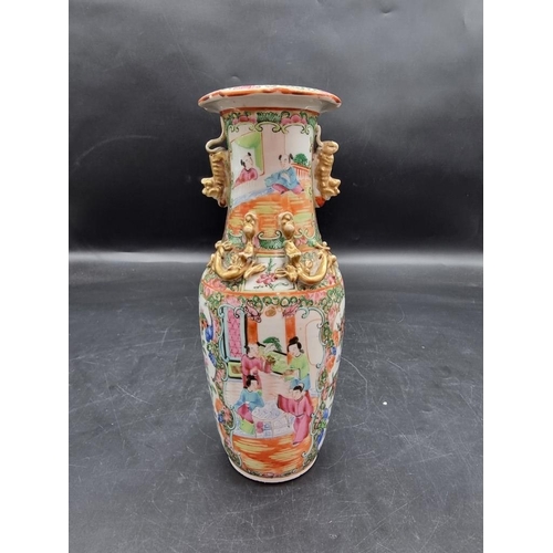 1441 - A Chinese famille rose twin handled vase, late 19th century, 25cm high. 