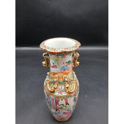 1441 - A Chinese famille rose twin handled vase, late 19th century, 25cm high. 