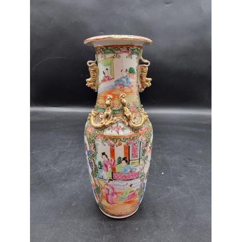 1441 - A Chinese famille rose twin handled vase, late 19th century, 25cm high. 