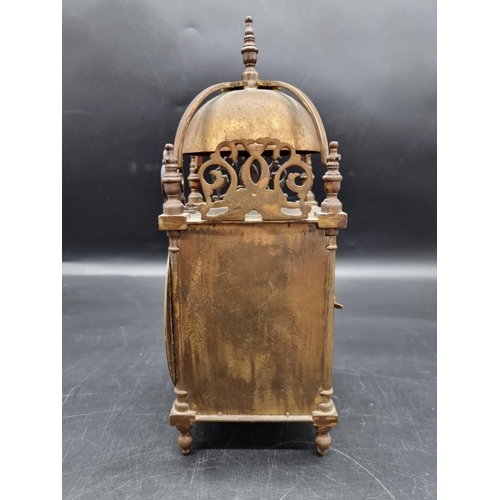 1443 - A brass lantern style clock, the dial inscribed 'Hampton & Sons Ltd, Pall Mall East', the moveme... 