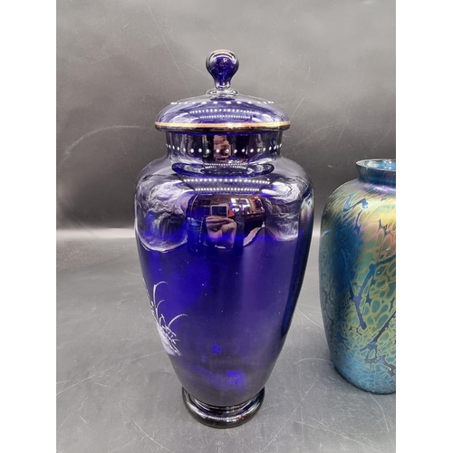 1444 - A large Bristol blue glass Mary Gregory style vase and cover, largest 32.5cm; together with two Isle... 