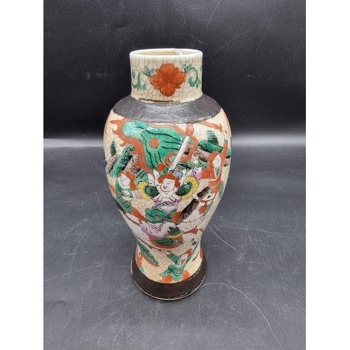 1451 - A Chinese famille rose crackle glazed vase, 25cm high, (restoration to rim); together with a Chinese... 