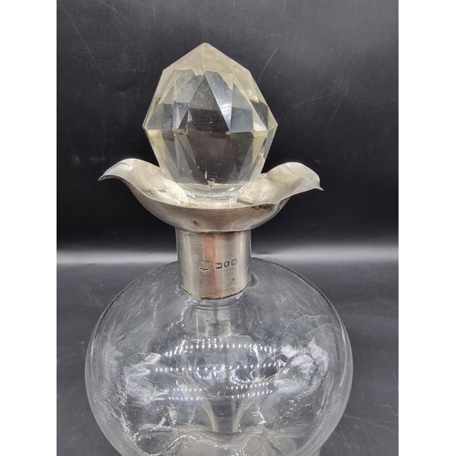 1452 - A silver mounted clear glass kluck kluck decanter and stopper, 27.5cm high; together with another pa... 