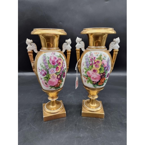 1453 - A pair of 19th century Continental porcelain twin handled vases, 29.5cm high, (s.d. to one).... 