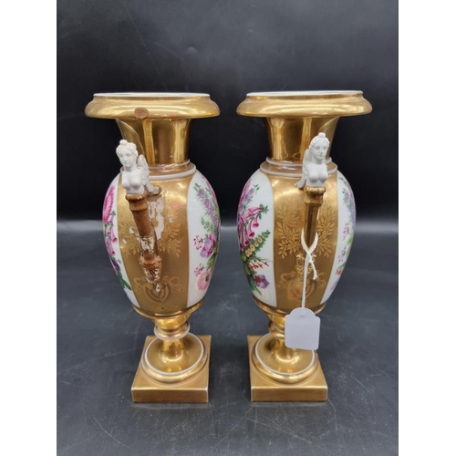 1453 - A pair of 19th century Continental porcelain twin handled vases, 29.5cm high, (s.d. to one).... 