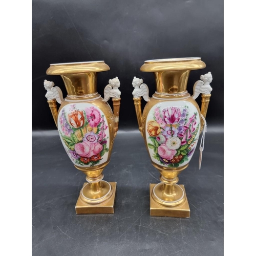 1453 - A pair of 19th century Continental porcelain twin handled vases, 29.5cm high, (s.d. to one).... 