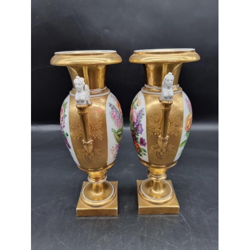 1453 - A pair of 19th century Continental porcelain twin handled vases, 29.5cm high, (s.d. to one).... 